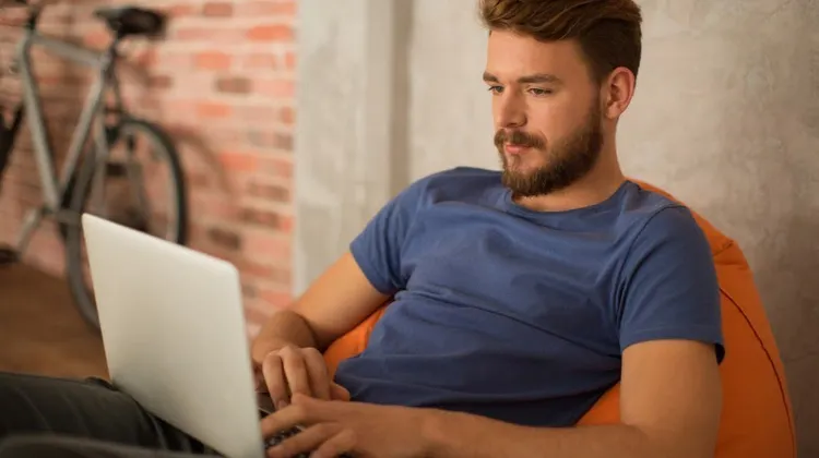 Men looking at laptop
